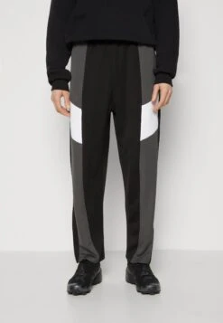 NIGHT ADDICT Unisex - Joggebukse - Black